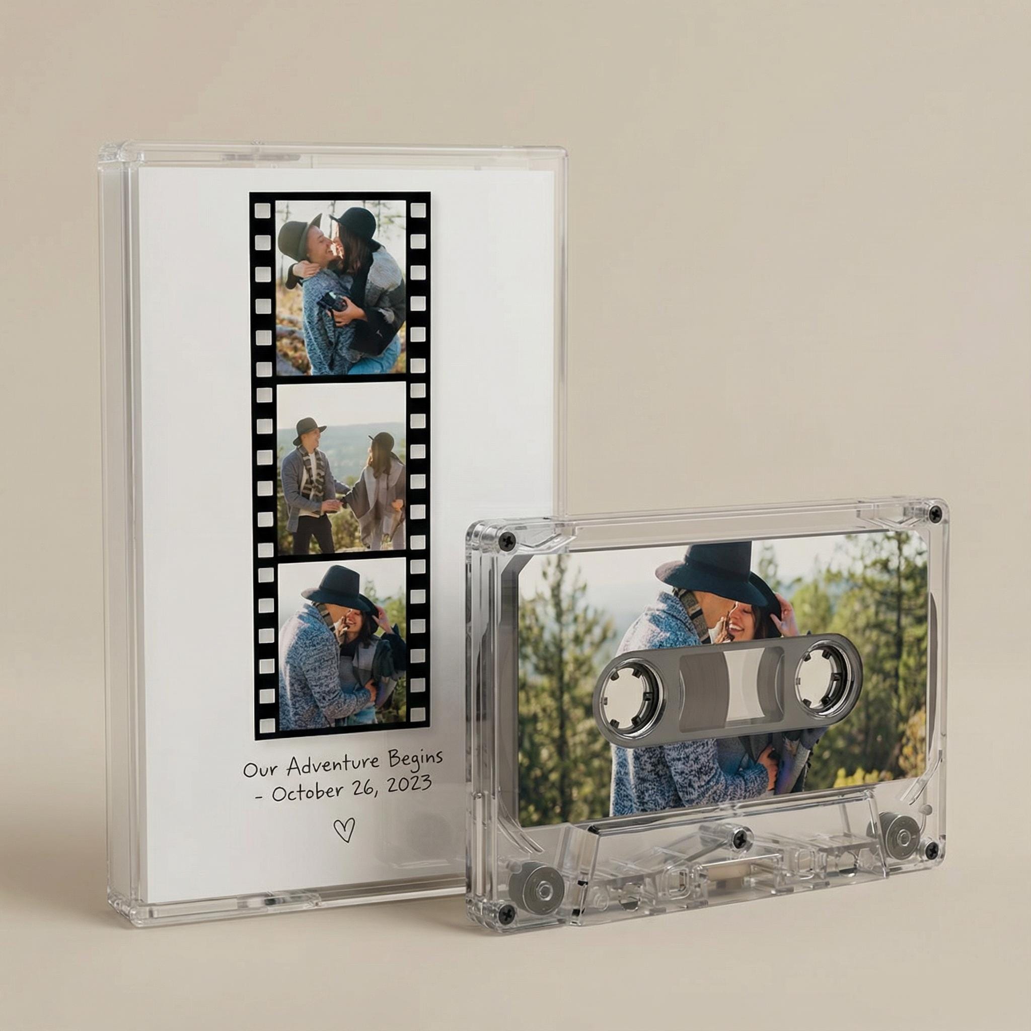 a photo album with a photo of a couple embracing, and a cassette tape with a photo of a couple embracing.
